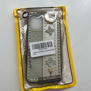 Grey, white, gold, and black iPhone 11 Pro phone case